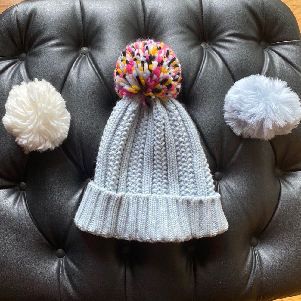 Vince Camuto baby blue hat with detachable pom-poms